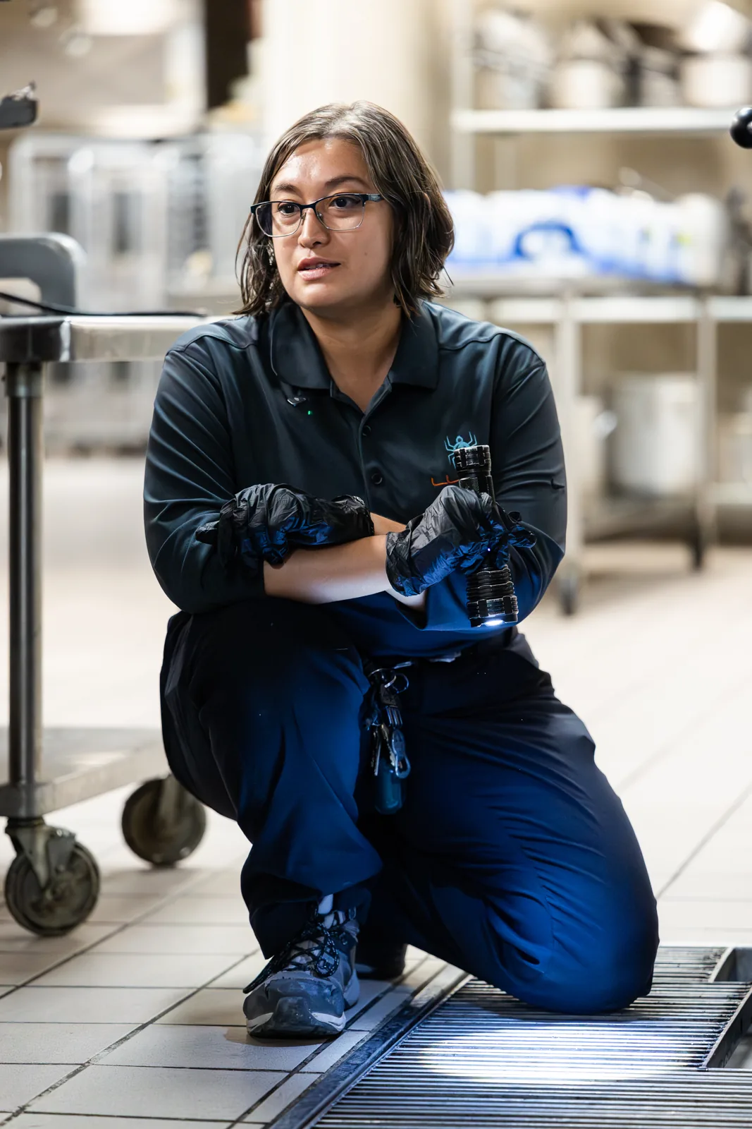 Lunar Pest technician documenting a pest control compliance inspection at a food processing facility